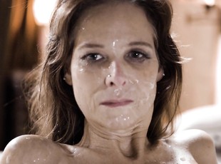 This woman gets her face and tits covered in sperm after a rough trio