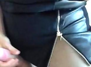 Wanking cock in leather skirt